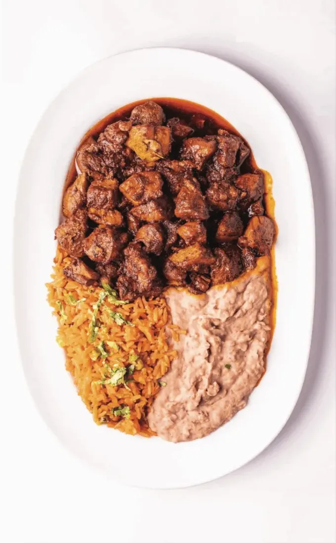 Asado de puerco de Las Palomas de Santiago, nombrado "Platillo Icónico de Nuevo León". ¡Urge que vayas a probarlo!