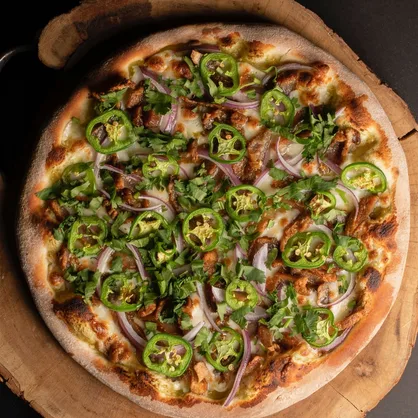 ¿Una pizza con chicharrón, jalapeño y salsa verde? En Barrio Antiguo hay un restaurante que prepara comida italiana y le da un toque regiomontano 