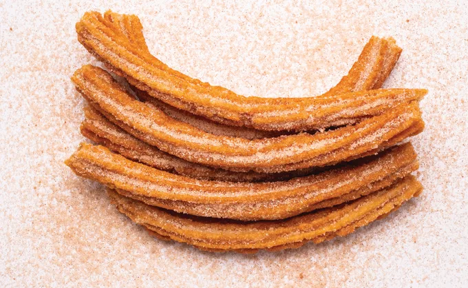 Con 64 años de trayectoria y un legado familiar, Inconfundibles Churros Toño ya son Platillo Icónico de Nuevo León - San Nicolás, Nuevo León